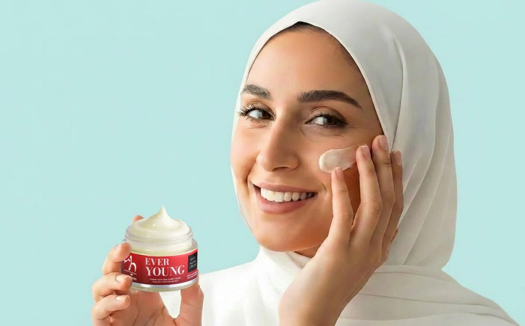 Woman applying lightweight hybrid skincare cream — simple daily beauty routine for Pakistani skin by GlowRiva